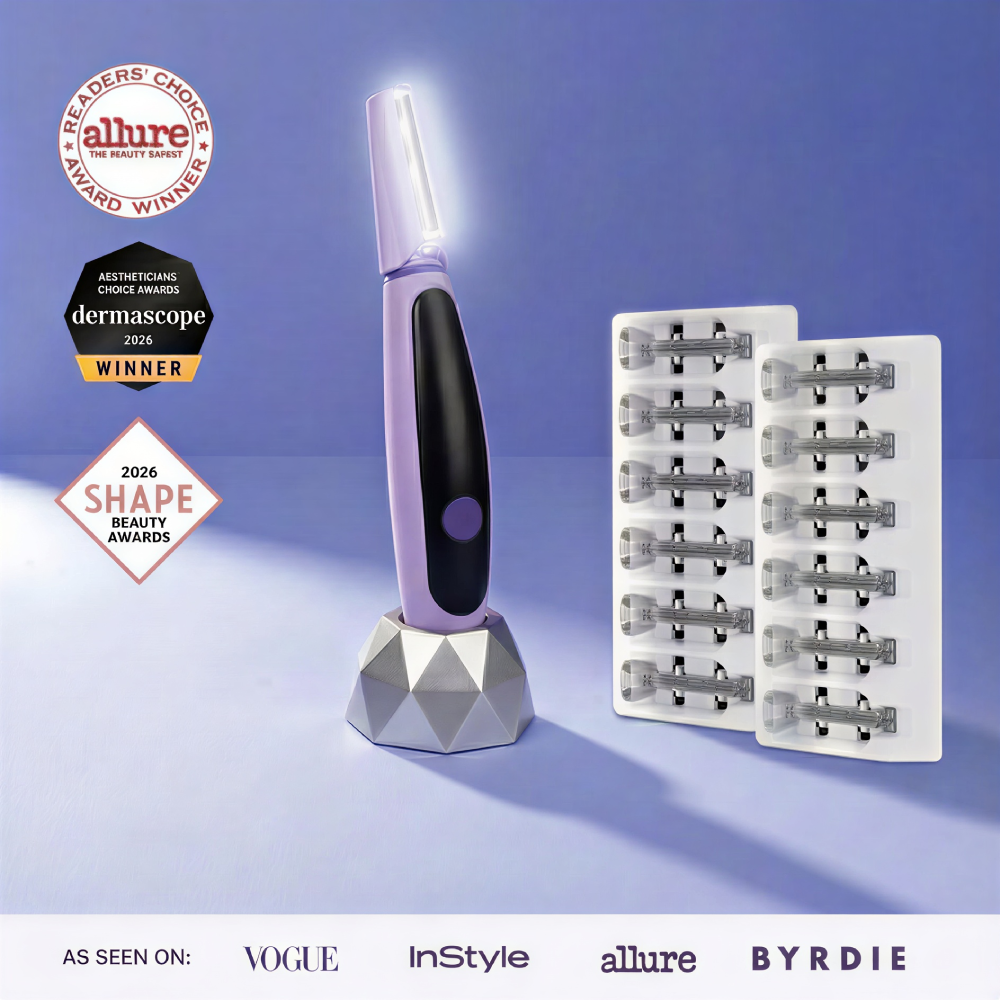 Lavender The Michael Todd Beauty سونيك سموث برو+ System shown in purple on a charging stand includes replacement heads, a blade pack, and displays beauty awards—perfect for sonic dermaplaning and professional exfoliation to remove peach fuzz.